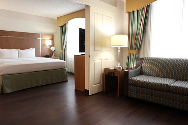 Santa Clara Biltmore Hotel & Suites - The Silicon Valley Executive Suite features seperate living and sleeping areas.